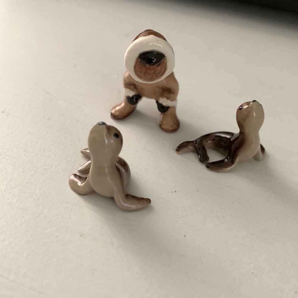 Porcelain Eskimo with two seals
